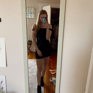 In Awe little black off the shoulder dress.